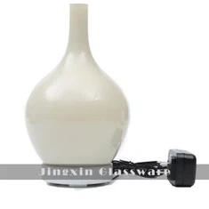 Máscara de vidro de cor diferente com difusor elétrico de óleo de aroma